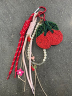 Accessoire de sac fait main – Gri-gri avec perles, cordons et crochet